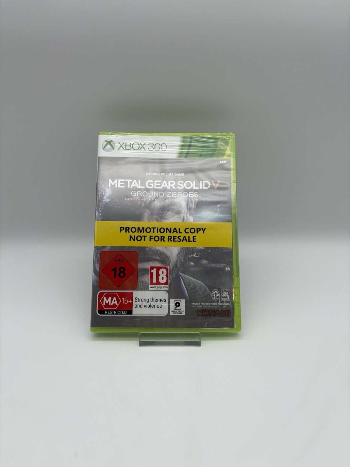 Metal Gear Solid V: Ground Zeroes (Microsoft Xbox 360) - NEU - Sealed - Promo